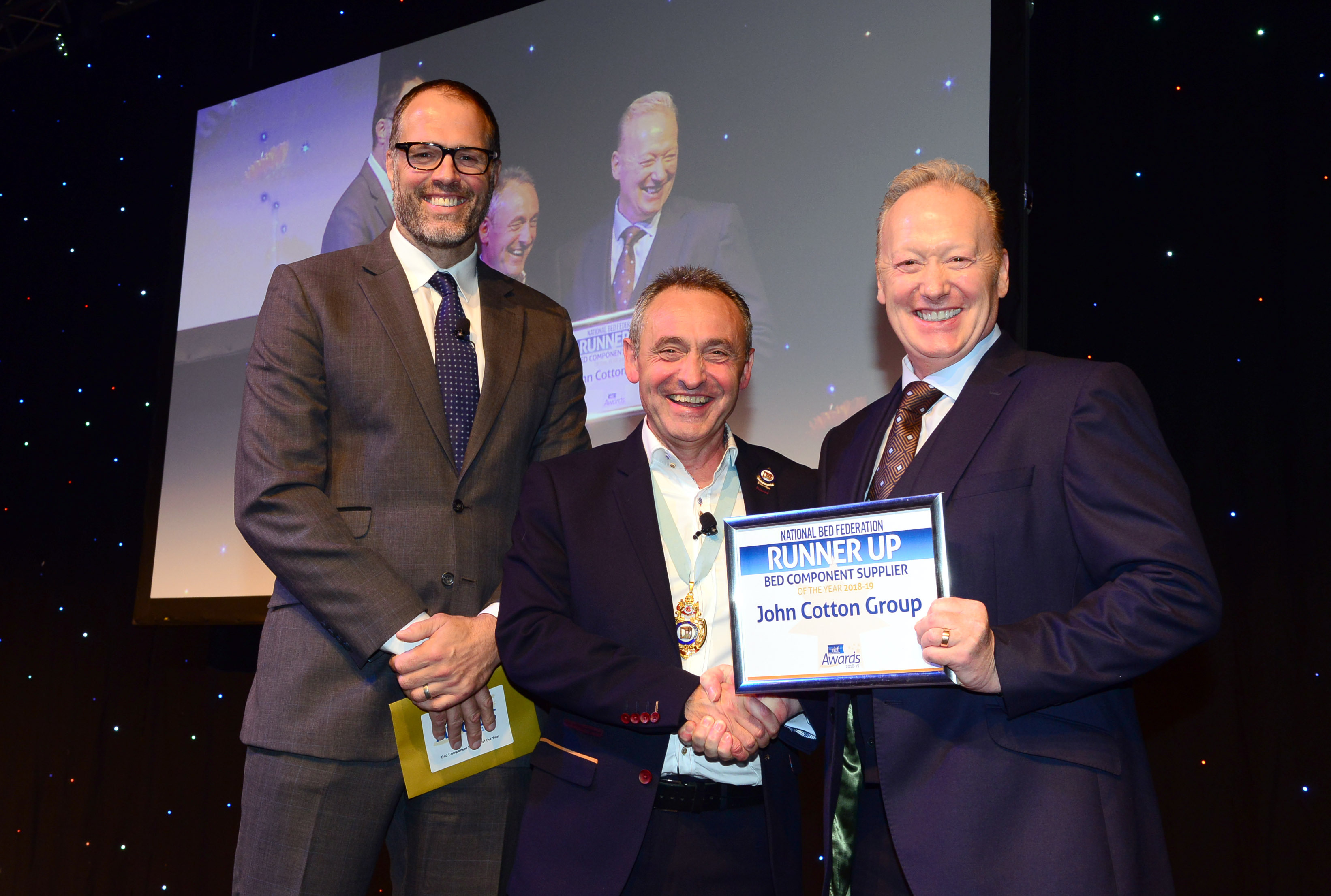 Mark Baron receives the award from presenter Martin Bayfield and Tony ...
